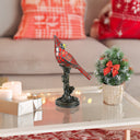 13.5"H Cardinal Stained Glass Bird Accent Lamp in a holiday decorated living room