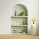 Set of 4 Family Favorites Tiffany Style Stained Glass Mini Accent Lamps on decorative shelves with plants and a vase against a light green wall.