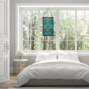 26"H Tiffany Style Stained Glass Brandi's Window Panel, displayed in a bright bedroom above a bed with white bedding.