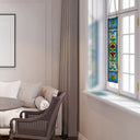 36"H Victorian Stained Glass Fleur De Lis Window Panel hanging in a living room window