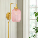 32"H Davia Retro Wall Sconce in a living room with a plant and window