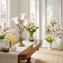 23.5"H Hand Blown Glass 3 Calla Lily Uplight Accent Lamp in a decorative table setting with flowers in a bright room.