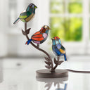 15" H Tiffany-Style Stained Glass Bird Novelty Table Lamp with a blurred background