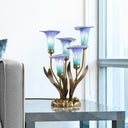 20"H Hand Blown Glass 5 Calla Lily Uplight Accent Lamp on a table in a room with a window.