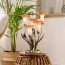 20"H Hand Blown Glass 5 Calla Lily Uplight Accent Lamp on a wicker stool in a room setting.