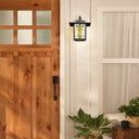 River of Goods Amber Stained Glass and Black 1-Light Outdoor Lantern Wall Sconce
