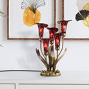20"H Hand Blown Glass 5 Calla Lily Uplight Accent Lamp on a white surface with framed artwork in the background.