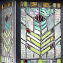 River of Goods Multicolor Stained Glass and Black 1-Light Outdoor Lantern Wall Sconce